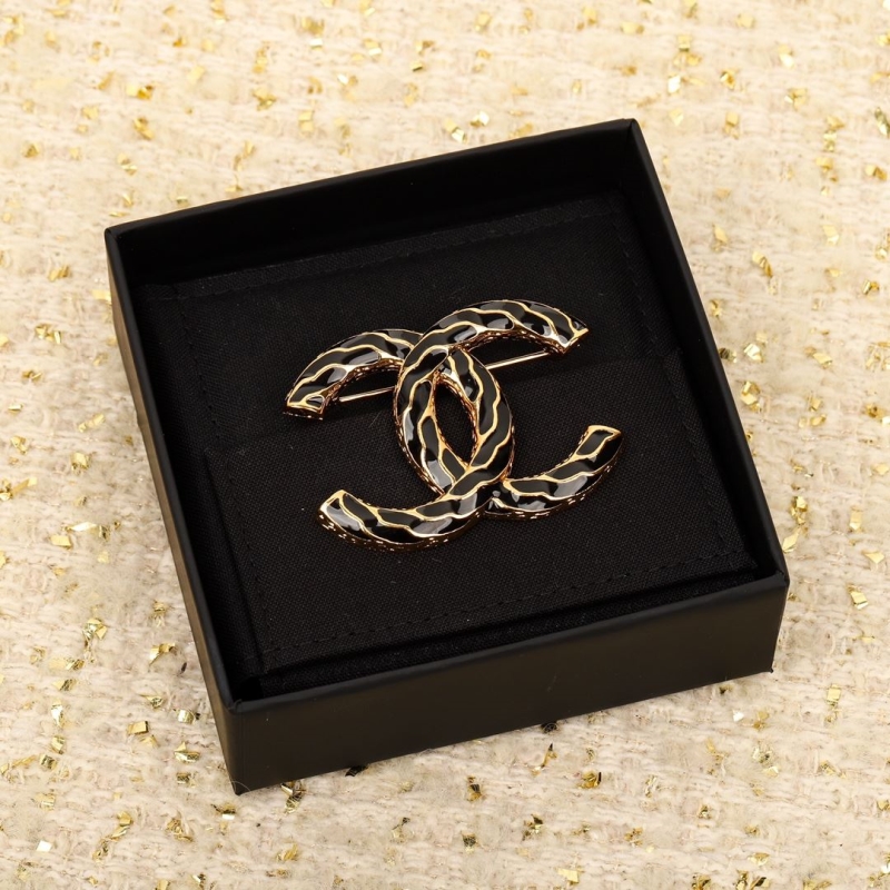 Ch**el brooches